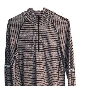 Lululemon Surge Long Sleeve Half-Zip Shirt.